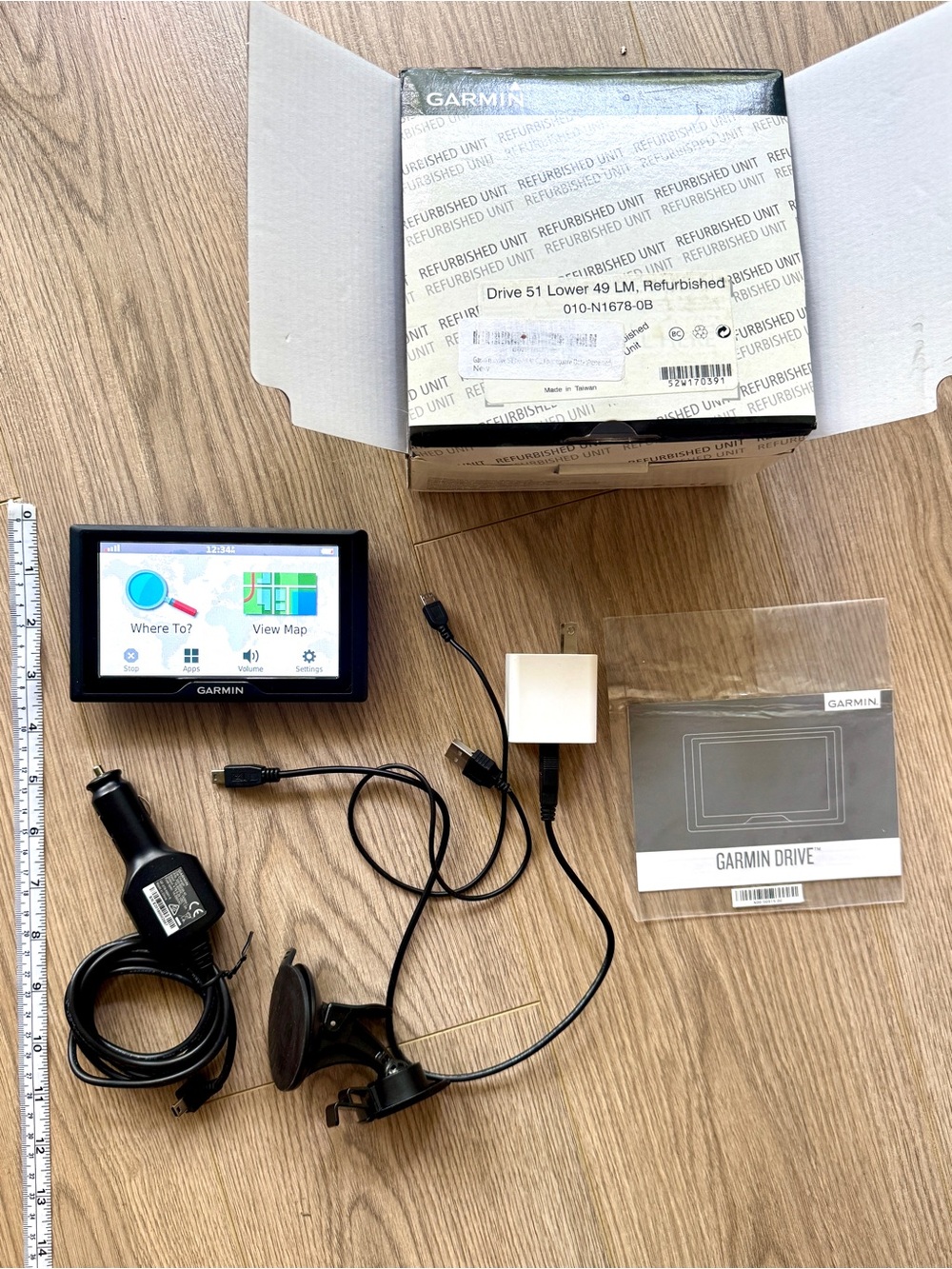 Garmin GPS Navigator with Black Display and White Charger